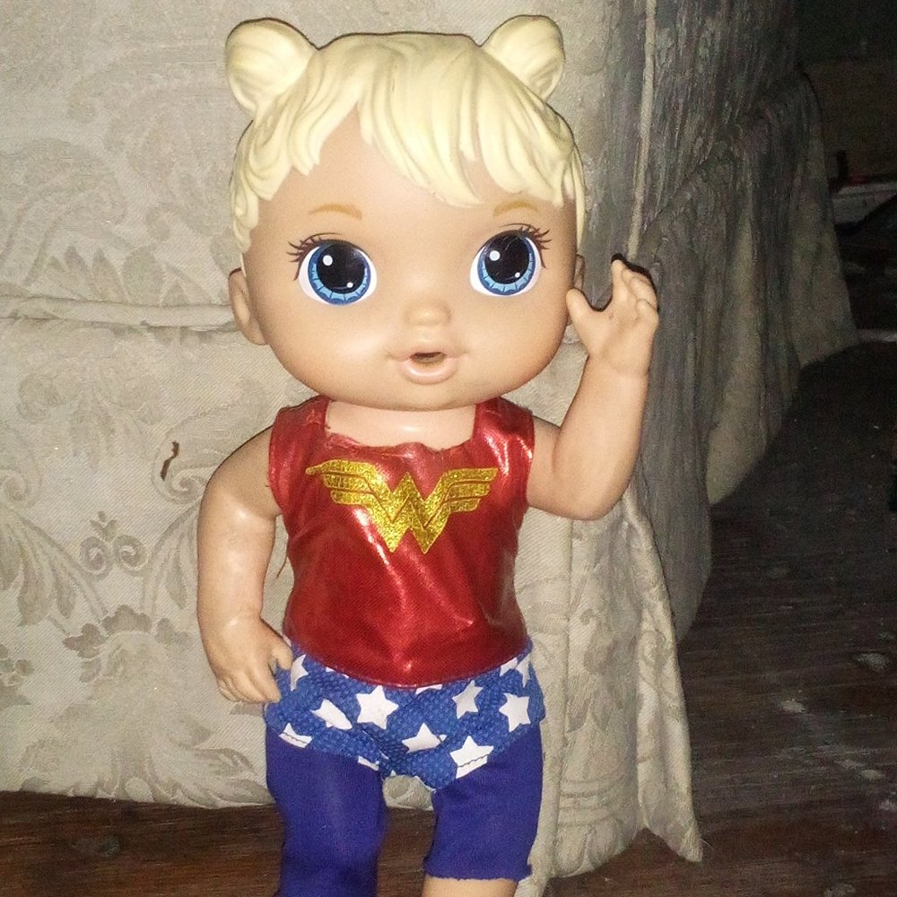 A  small baby alive doll
